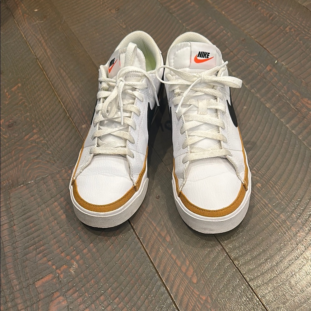 Nike Women’s White and Gold Sneakers